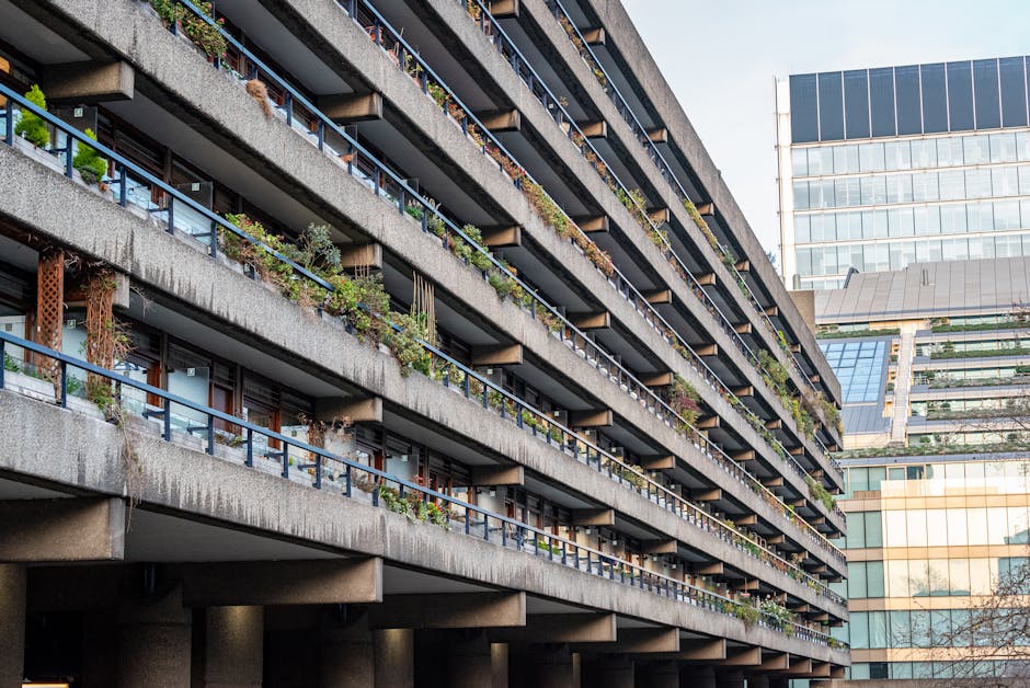 A detailed close-up of a computer screen displaying colorful lines of code in a programming interface. The screen shows various text elements in shades of green, yellow, blue, orange, and white, set a